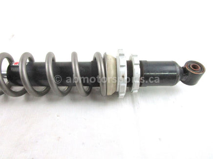 A used Ski Shock from a 2004 KING CAT 900 Arctic Cat OEM Part # 1703-520 for sale. Arctic Cat snowmobile parts? Check our online catalog for parts!