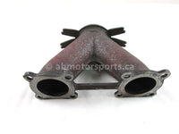 A used Y Pipe Exhaust Manifold from a 2012 M8 SNO PRO Arctic Cat OEM Part # 1712-559 for sale. Arctic Cat snowmobile used parts online in Canada!