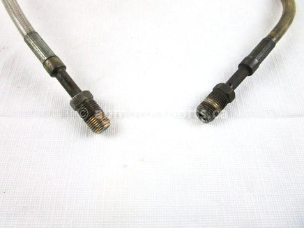 A used Brake Hose from a 2005 FUSION 900 Polaris OEM Part # 2202787 for sale. Online Polaris snowmobile parts in Alberta, shipping daily across Canada!