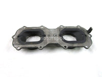 A used Throttle Body Adaptor from a 2008 RMK 700 Polaris OEM Part # 1203383 for sale. Check out Polaris snowmobile parts in our online catalog!