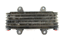 A used Oil Cooler from a 1992 KING QUAD 300 Suzuki OEM Part # 16600-19B00 for sale. Suzuki ATV parts… Shop our online catalog… Alberta Canada!