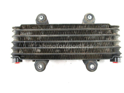 A used Oil Cooler from a 1992 KING QUAD 300 Suzuki OEM Part # 16600-19B00 for sale. Suzuki ATV parts… Shop our online catalog… Alberta Canada!