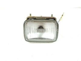 A used Head Light from a 1992 KING QUAD 300 Suzuki OEM Part # 35100-19B03 for sale. Suzuki ATV parts… Shop our online catalog… Alberta Canada!