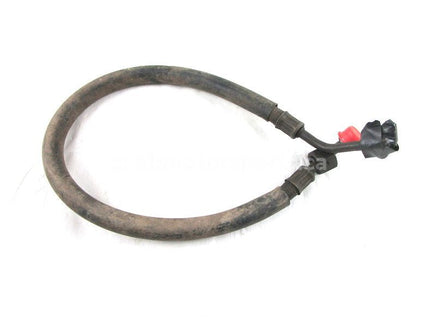 A used Oil Cooler Hose Left from a 1998 Grizzly 600 Yamaha OEM Part # 4WV-13464-00-00 for sale. Yamaha ATV parts. Shop our online catalog. Alberta Canada!