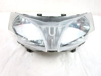 A used Headlight from a 2003 RX-1 Yamaha OEM Part # 8FA-84310-00-00 for sale. Yamaha snowmobile parts… Shop our online catalog… Alberta Canada!