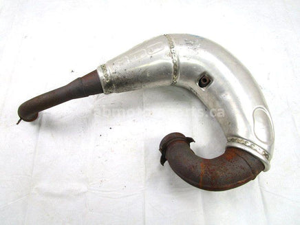 A used Tuned Pipe from a 2010 M8 SNO PRO Arctic Cat OEM Part # 1712-563 for sale. Arctic Cat snowmobile parts? Our online catalog has parts to fit your unit!