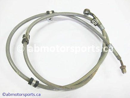 Used Can Am ATV OUTLANDER MAX 800 OEM part # 705600424 rear brake line for sale