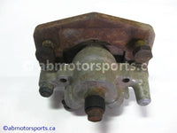 Used Can Am ATV TRAXTER MAX 500 XT OEM part # 705600122 rear right brake caliper for sale