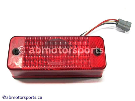 Used Can Am ATV TRAXTER MAX 500 XT OEM part # 710000102 tail light for sale