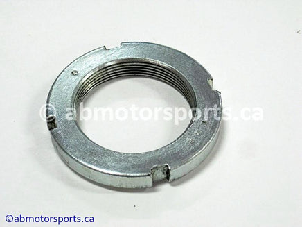 Used Can Am ATV OUTLANDER MAX 400 OEM part # 706000221 swing arm nut for sale