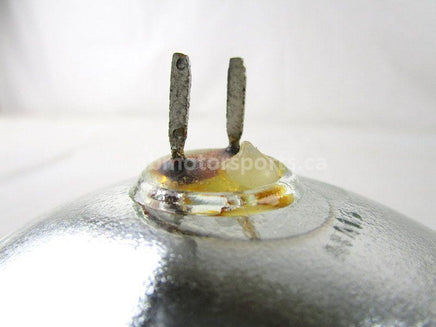 A used Head Light from a 2003 TRAXTER 500 XT Can Am OEM Part # 710000001 for sale. Check out our online catalog for more parts that will fit your unit!
