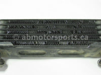 Used Honda ATV TRX 350 FM2 OEM part # 15600-HM7-610 oil cooler for sale