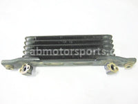 Used Honda ATV TRX 350 FM2 OEM part # 15600-HM7-610 oil cooler for sale