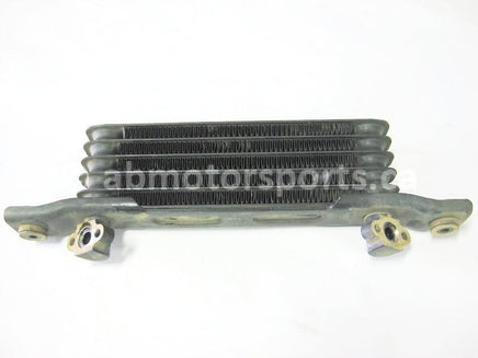 Used Honda ATV TRX 350 FM2 OEM part # 15600-HM7-610 oil cooler for sale