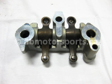 Used Honda ATV TRX 350 FM2 OEM part # 14411-HN5-670 rocker arm holder for sale
