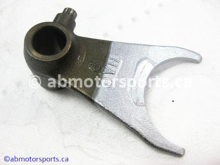 Used Honda ATV TRX 300 FW OEM part # 24211-HA0-010 right shift fork for sale