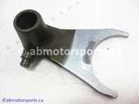 Used Honda ATV TRX 300 FW OEM part # 24211-HA0-010 right shift fork for sale