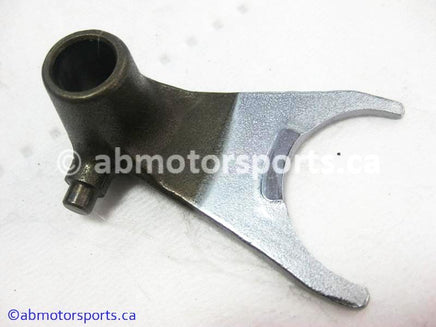 Used Honda ATV TRX 300 FW OEM part # 24211-HA0-010 right shift fork for sale