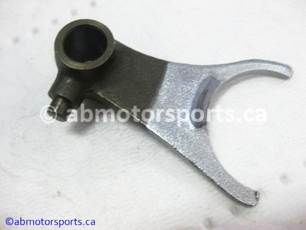 Used Honda ATV TRX 300 FW OEM part # 24212-HC4-000 center shift fork for sale