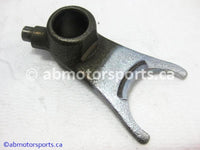 Used Honda ATV TRX 300 FW OEM part # 24213-HA0-000 left gearshift fork for sale