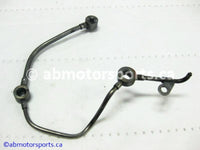 Used Honda ATV TRX 300 FW OEM part # 15510-HA7-670 oil pipe for sale