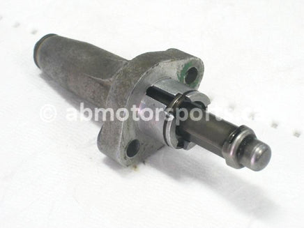 Used Honda ATV TRX 350D FOURTRAX 4X4 OEM part # 14520-HA0-771 tensioner lifter for sale