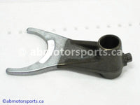 Used Honda ATV TRX 400FW OEM part # 24212-HM7-000 center gearshift fork for sale