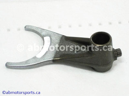 Used Honda ATV TRX 400FW OEM part # 24212-HM7-000 center gearshift fork for sale