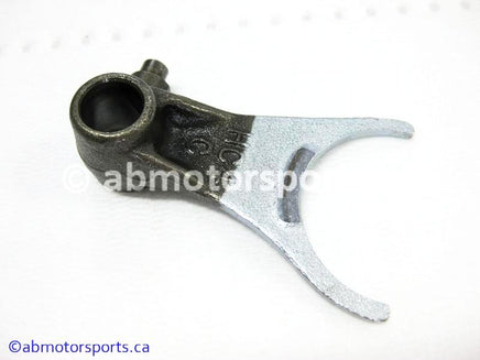Used Honda ATV TRX 300 FW OEM part # 24212-HC4-000 center shift fork for sale