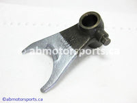 Used Honda ATV TRX 300 FW OEM part # 24211-HA0-010 right shift fork for sale