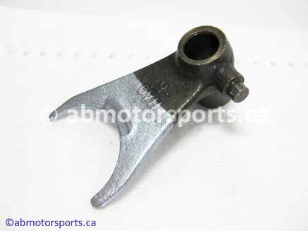 Used Honda ATV TRX 300 FW OEM part # 24211-HA0-010 right shift fork for sale