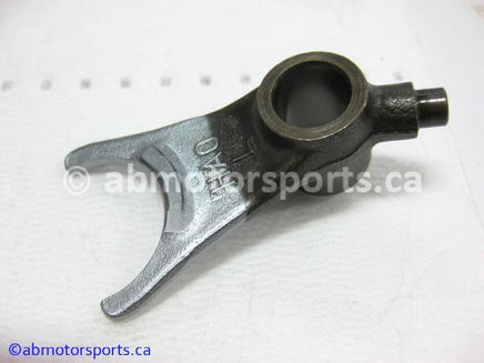 Used Honda ATV TRX 300 FW OEM part # 24213-HA0-000 left gearshift fork for sale