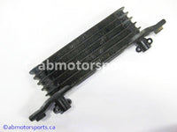 Used Honda ATV TRX 350 FM OEM part # 15600-HM7-610 oil cooler for sale