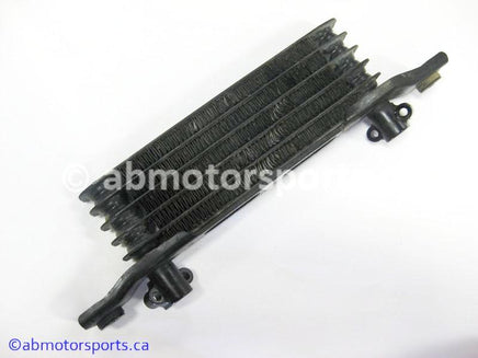 Used Honda ATV TRX 350 FM OEM part # 15600-HM7-610 oil cooler for sale