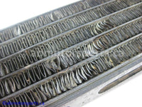 Used Honda ATV TRX 350 FM OEM part # 15600-HM7-610 oil cooler for sale