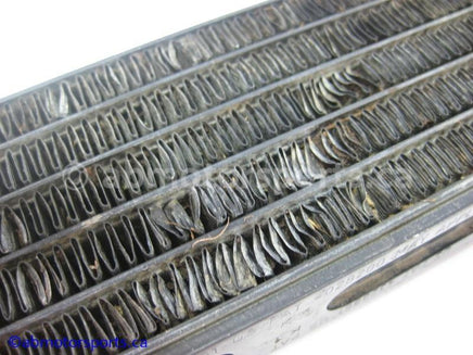 Used Honda ATV TRX 350 FM OEM part # 15600-HM7-610 oil cooler for sale
