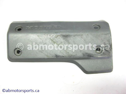 Used Honda ATV TRX 350 FM OEM part # 11320-HN5-670 left engine side cover for sale