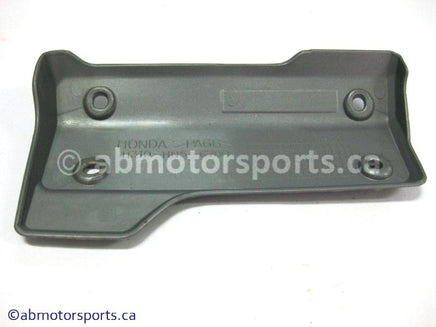 Used Honda ATV TRX 350 FM OEM part # 11320-HN5-670 left engine side cover for sale