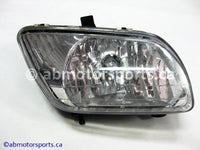 Used Honda ATV TRX 350 FM OEM part # 33110-HN5-M40 right head light for sale