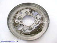 Used Honda ATV TRX 350 FM OEM part # 45110-HN5-671 OR 45110HN5671 right backing brake plate for sale