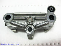 Used Honda ATV TRX 350 FM OEM part # 14411-HN5-670 OR 14411HN5670 rocker arm holder for sale