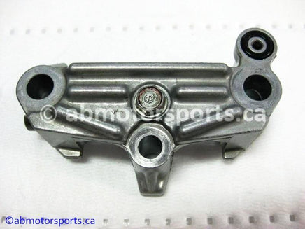 Used Honda ATV TRX 350 FM OEM part # 14411-HN5-670 OR 14411HN5670 rocker arm holder for sale