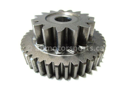 A used Reverse Idle Gear 15T 39T from a 2006 TRX 500FM Honda OEM Part # 23721-HP0-A00 for sale. Shop our online catalog - Alberta Canada!