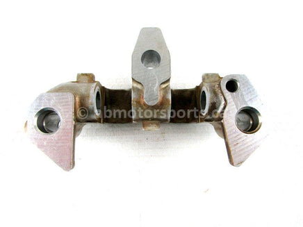 A used Rocker Arm Holder from a 2003 TRX450FM Honda OEM Part # 14411-HM7-000 for sale. Honda ATV parts… Shop our online catalog… Alberta Canada!