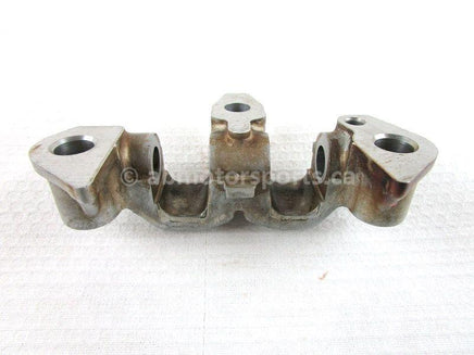 A used Rocker Arm Holder from a 2003 TRX450FM Honda OEM Part # 14411-HM7-000 for sale. Honda ATV parts… Shop our online catalog… Alberta Canada!