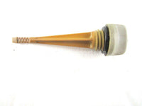 A used Oil Dipstick from a 1984 ATC 200ES Honda OEM Part # 15650-VM5-000
 for sale. Check out our online catalog for more parts that will fit your unit!