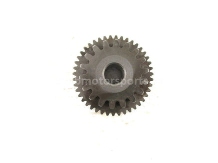 A used Starter Reduction Gear 43T 18T from a 2001 TRX450ES Honda OEM Part # 28140-HN0-A00 for sale. Honda ATV parts online? Shop our online catalog!!