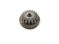 A used Starter Reduction Gear 43T 18T from a 2001 TRX450ES Honda OEM Part # 28140-HN0-A00 for sale. Honda ATV parts online? Shop our online catalog!!