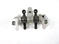 A used Rocker Arm Holder from a 2001 TRX450ES Honda OEM Part # 14411-HM7-000 for sale. Honda ATV parts online? Shop our online catalog!!