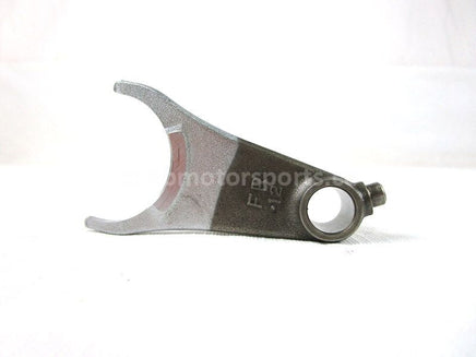 A used Front Shift Fork from a 2001 TRX450ES Honda OEM Part # 24211-HM7-000 for sale. Honda ATV parts online? Shop our online catalog!!